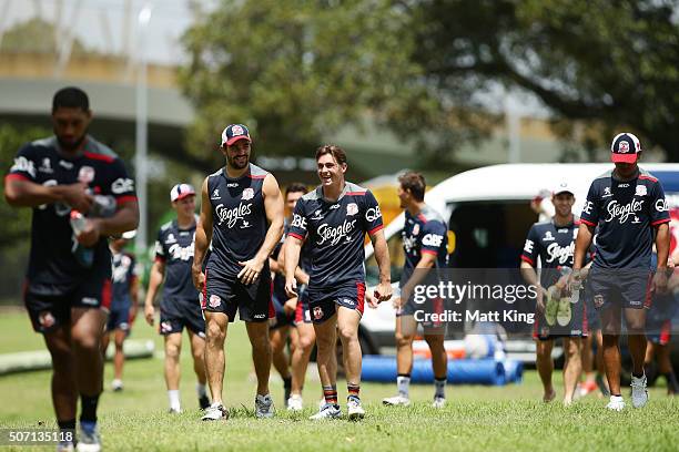 Roosters players walk back after training during a Sydney Roosters training session on January 28, 2016 in Sydney, Australia.