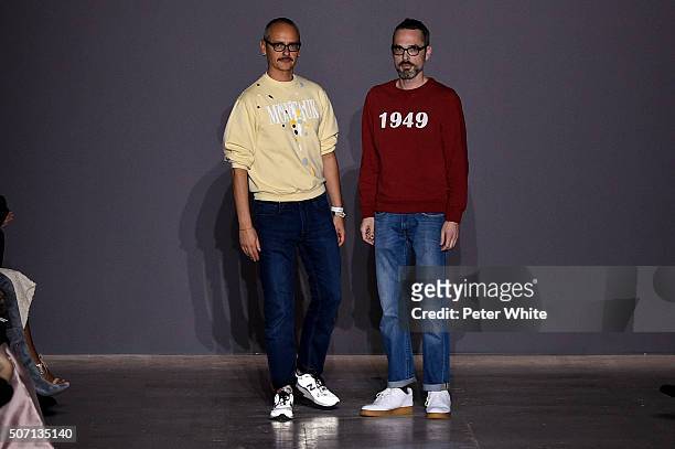 Designers Viktor Horsting and Rolf Snoeren walk the runway during the Viktor&Rolf Spring Summer 2016 show as part of Paris Fashion Week on January...