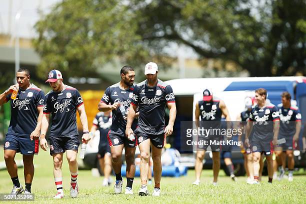 Roosters players walk back after training during a Sydney Roosters training session on January 28, 2016 in Sydney, Australia.
