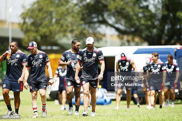 Roosters players walk back after training during a Sydney Roosters training session on January 28, 2016 in Sydney, Australia.