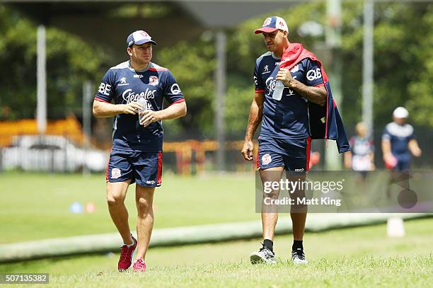 Mitchell Aubusson and Blake Ferguson walk back after training during a Sydney Roosters training session on January 28, 2016 in Sydney, Australia.