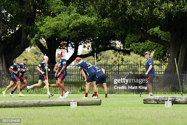 Roosters coach Trent Robinson watches his players during a Sydney Roosters training session on January 28, 2016 in Sydney, Australia.