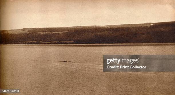 The Loch Ness Monster' . A photograph purporting to show the Loch Ness Monster . From These Tremendous Years 1919-1938. [Daily Express, London, 1938]...