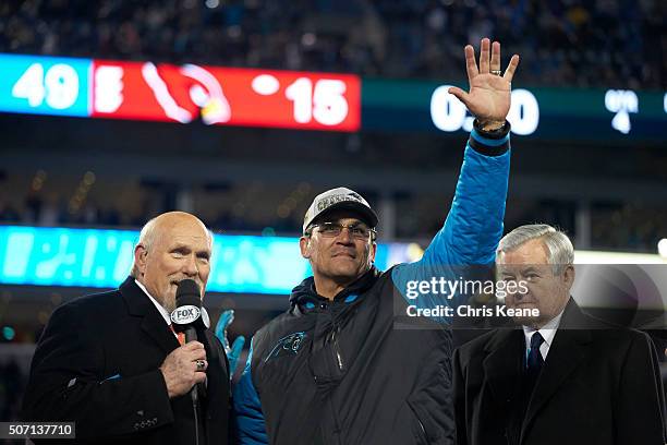 Playoffs: Carolina Panthers head coach Ron Rivera victorious during media interview with Fox Sports announcer Terry Bradshaw and owner Jerry...