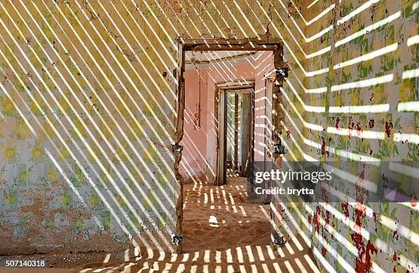 house interior in the ghost town kolmanskop, namibia - kolmanskop namibia stock pictures, royalty-free photos & images