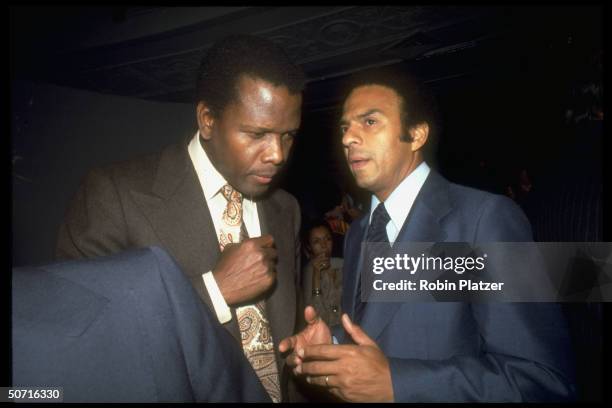 Film actor Sidney Poitier and Andrew Young.