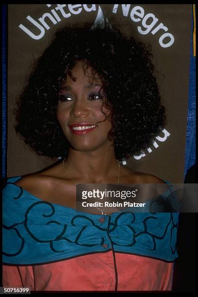 Singer and actress Whitney Houston as a spokesperson for the United Negro College Fund.