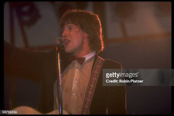 Ray Davies of the Kinks singing on stage.