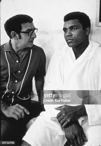 Boxing great Muhammad Ali with his trainer Angelo Dundee.