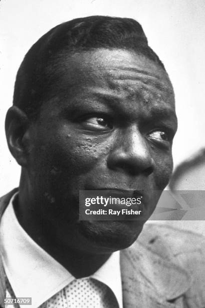 Singer/ pianist Nat King Cole during an interview.