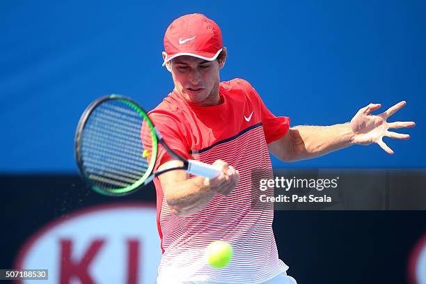 Oliver Anderson of Australia plays a forehand in his junior quarter finals match against Max Purcell of Australia during the Australian Open 2016...