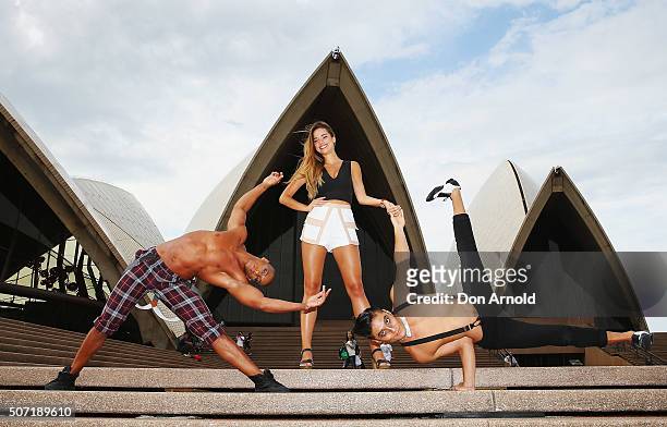 Miss Universe Australia Monika Radulovic poses alongside Jerome Sordillon and Shun Sugimoto from the the cast of Blanc de Blanc at Sydney Opera House...