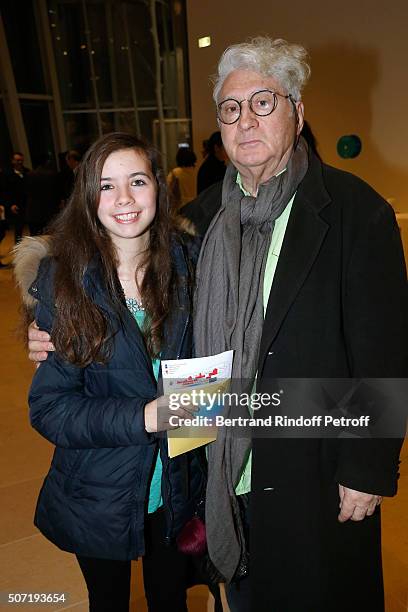 Photographer Jean Lariviere and Justine attend the "Bentu" Exhibition at the Louis Vuitton Foundation, Co-organized with the "Ullens Center for...