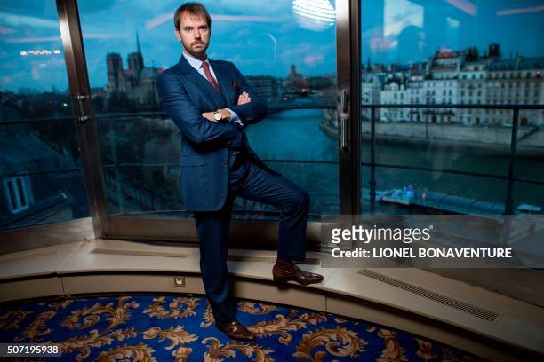Director of La tour d'Argent restaurant Andre Terrail poses in Paris on January 26, 2016. - Some 3,000 objects from "La Tour d'Argent " will be...