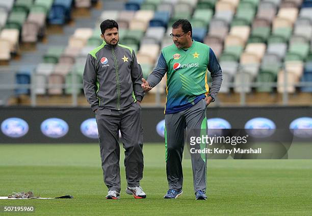 Azhar Ali and Waqar Younis of Pakistan inspect the pitch at McLean Park on January 28, 2016 in Napier, New Zealand.
