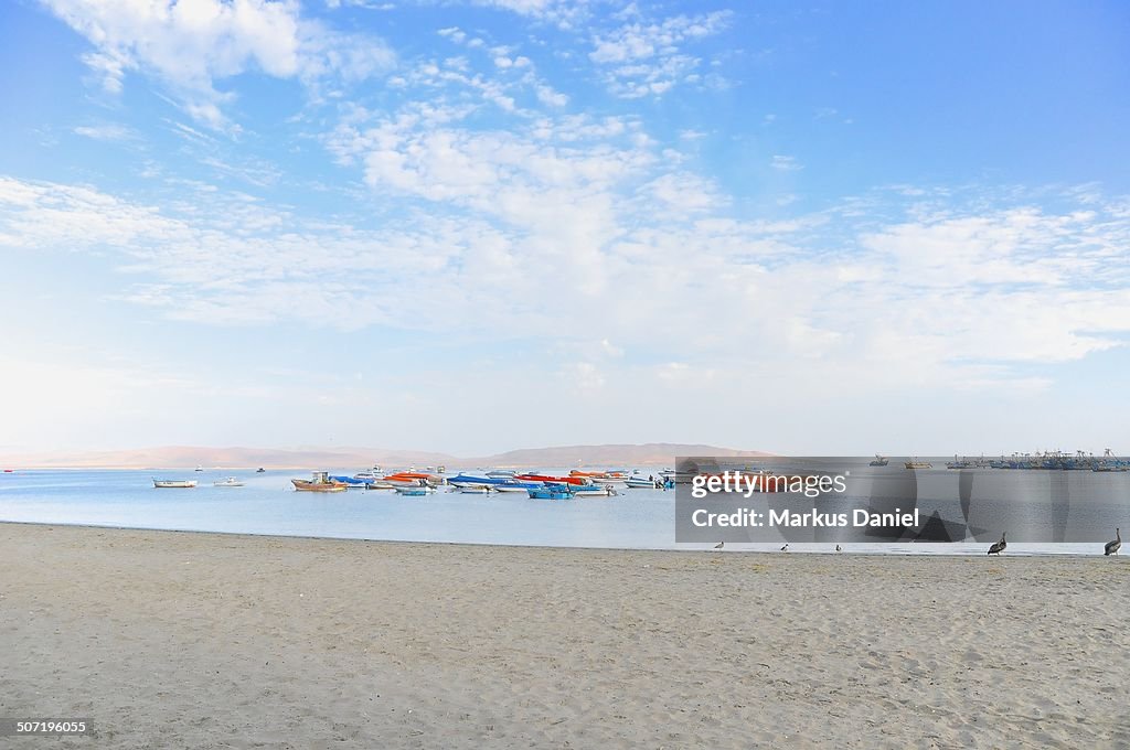 Beach and boats in Paracas, Peru
