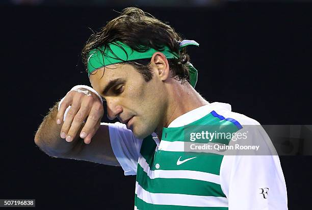 Roger Federer of Switzerland looks on in his semi final match against Novak Djokovic of Serbia during day 11 of the 2016 Australian Open at Melbourne...