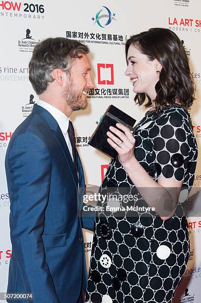 Actress Anne Hathaway and husband Adam Shulman attend the LA Art Show And Los Angeles Fine Art Show's 2016 Opening Night Premiere Party Benefiting...