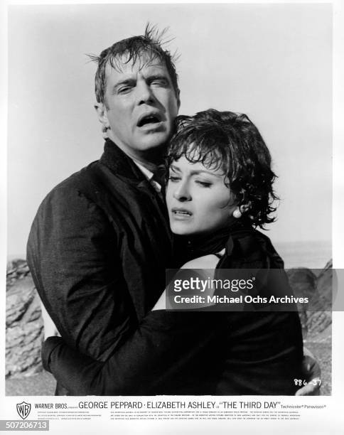 George Peppard embraces Elizabeth Ashley after she is almost murdered in a scene from the Warner Bros. Movie "The Third Day", circa 1965.