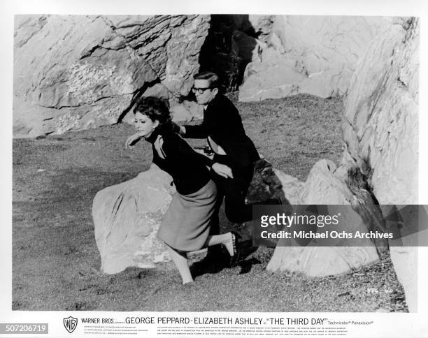 Elizabeth Ashley flees as a attacker Arte Johnson tries to kill her in a scene from the Warner Bros. Movie "The Third Day", circa 1965.