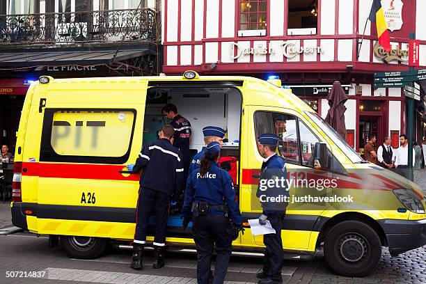 ambulance and police in brussels - belgium police stock pictures, royalty-free photos & images