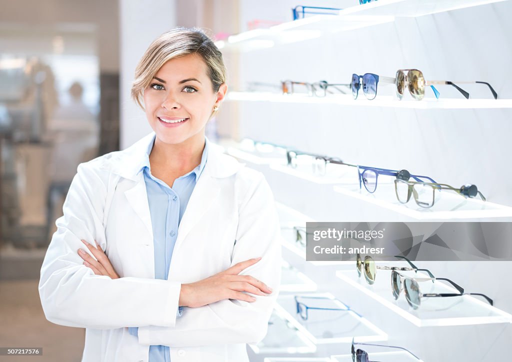 Optician selling glasses at the optics