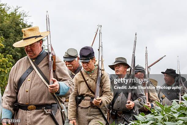 Confederate Soldiers in Military Uniform March to the Battlefield Carrying Rifles During the 150th Anniversary of the Historic Battle of Chickamauga...