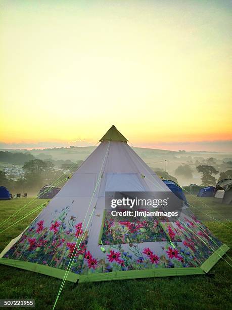 glamping! - teepee stock pictures, royalty-free photos & images