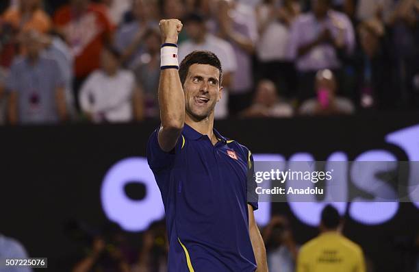 Novak Djokovic of Serbia celebrates winning his semi final match against Roger Federer of Switzerland during day 11 of the 2016 Australian Open at...