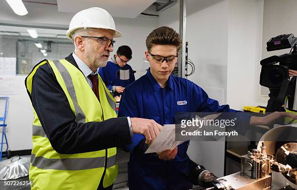Labour leader Jeremy Corbyn speaks with an apprentice during a visit to the Science, Technology, Engineering and Maths further education college on...