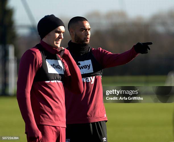 Joey O'Brien and Winston Reid of West Ham United during Training at Chadwell Heath on January 28, 2016 in Chadwell Heath, England.