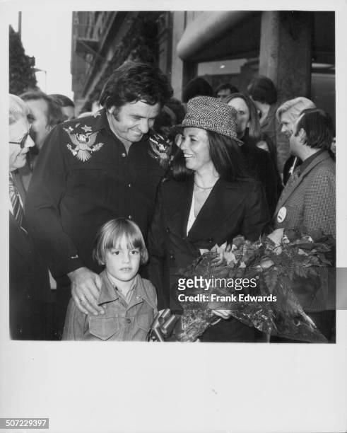 Musicians and spouses Johnny Cash and June Carter, with their son John Carter Cash, attending the ceremony where Johnny was presented with a star on...