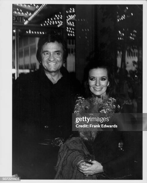Musicians and spouses Johnny Cash and June Carter, attending the CBS Television party at Century Plaza Hotel, Los Angeles, CA, May 1980.