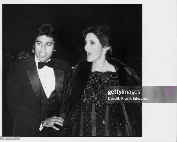 Actor Eric Estrada and his date, Beverly Sassoon, arriving at the Variety Club Dinner at NBC Television, Burbank, California, November 1981.