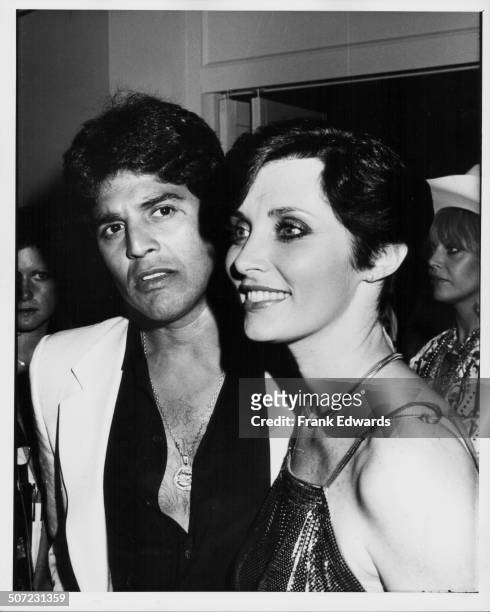 Actor Eric Estrada and his date, Beverly Sassoon, attending the 'Show Vote' concert at the Los Angeles Forum, California, October 1980.