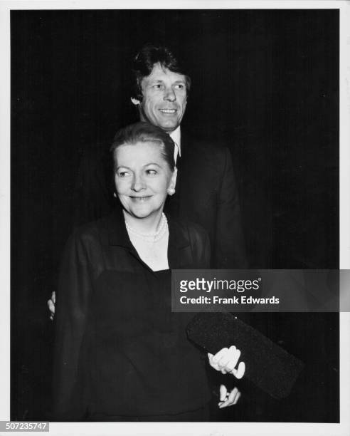 Actress Joan Fontaine with her escort, designer Nolan Miller, attending a screening of the television movie 'The Users' at MGM Studios, Los Angeles,...