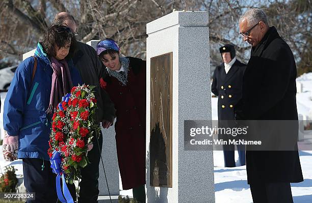 Administrator Charles Bolden bows his head as he joins family members in a "Day of Remembrance" ceremony to pay tribute to the crews of Apollo 1 and...