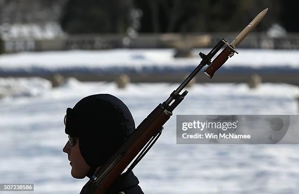 Member of the "Old Guard" stands post at the Tomb of the Unknown Solider at Arlington National Cemetery January 28, 2016 in Washington, DC. A "Day of...