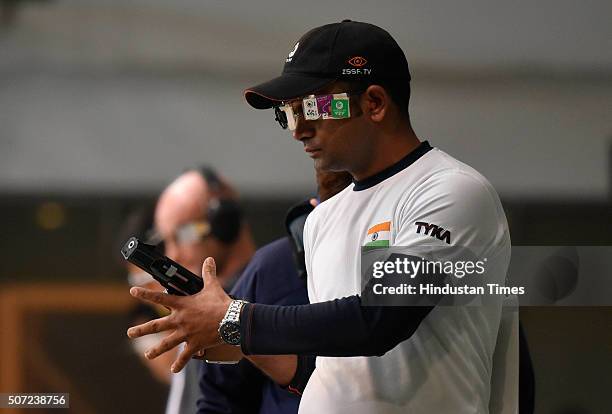 Shooter Vijay Kumar in action during the 25m rapid fire pistol in Asian Olympic Qualifying Competition at Dr. Karni Singh Shooting Range on January...