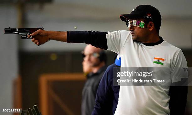 Shooter Vijay Kumar in action during the 25m rapid fire pistol in Asian Olympic Qualifying Competition at Dr. Karni Singh Shooting Range on January...