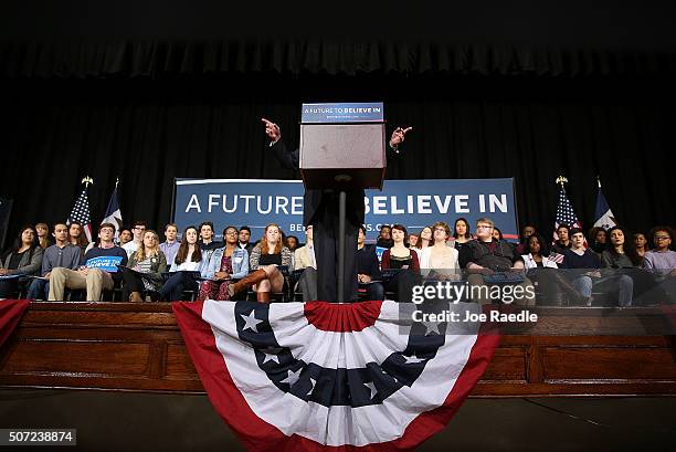 Democratic presidential candidate Sen. Bernie Sanders gestures as he speaks from behind his podium during a forum at Roosevelt High School on January...