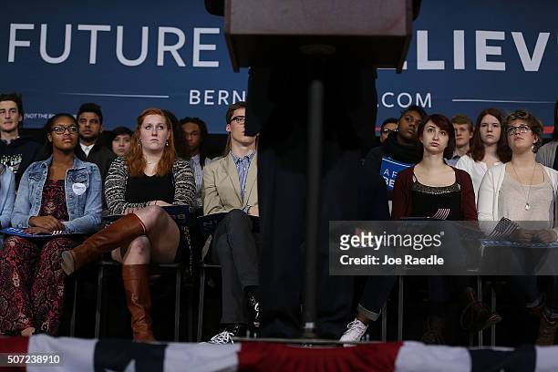 People listen as Democratic presidential candidate Sen. Bernie Sanders speaks during a forum at Roosevelt High School on January 28, 2016 in Des...