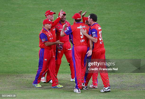 Richard Levi of Gemini Arabians celebrates with teammates after catching Jacques Kallis of Libra Legends during the opening match of the Oxigen...