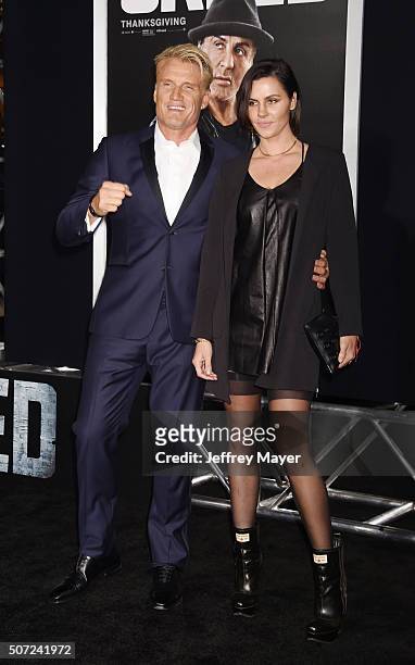 Actor Dolph Lundgren and Jenny Sandersson arrive at the premiere of Warner Bros. Pictures' 'Creed' at Regency Village Theatre on November 19, 2015 in...
