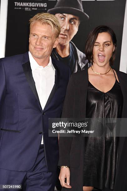 Actor Dolph Lundgren and Jenny Sandersson arrive at the premiere of Warner Bros. Pictures' 'Creed' at Regency Village Theatre on November 19, 2015 in...