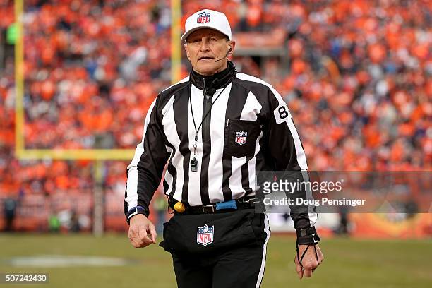 Referee Ed Hochuli looks on in the AFC Championship game at Sports Authority Field at Mile High on January 24, 2016 in Denver, Colorado.