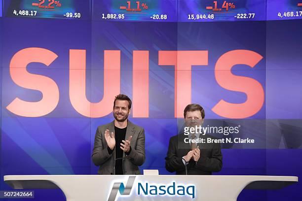 Actor Gabriel Macht , Senior Managing Director of NASDAQ Eric Bernbach, the Comcast Corporation and USA Network ring the Nasdaq opening bell at the...