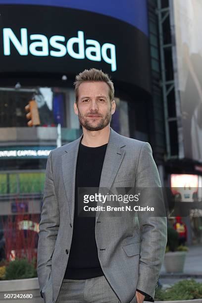 Actor Gabriel Macht poses for photographs after ringing the Nasdaq opening bell at the NASDAQ MarketSite on January 28, 2016 in New York City.