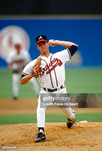 Tom Glavine of the Atlanta Braves pitches during a Major League Baseball game circa 1990 at Atlanta-Fulton County Stadium in Atlanta, Georgia....