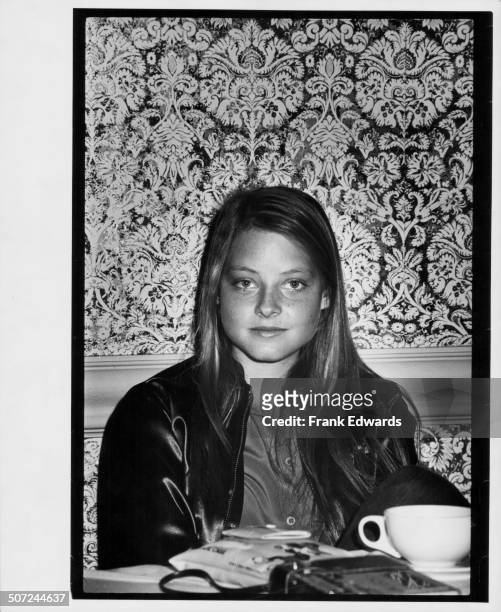 Actress Jodie Foster sitting at a table, at a Hollywood Foreign Press Association press conference for the movie 'Foxes', April 1980.